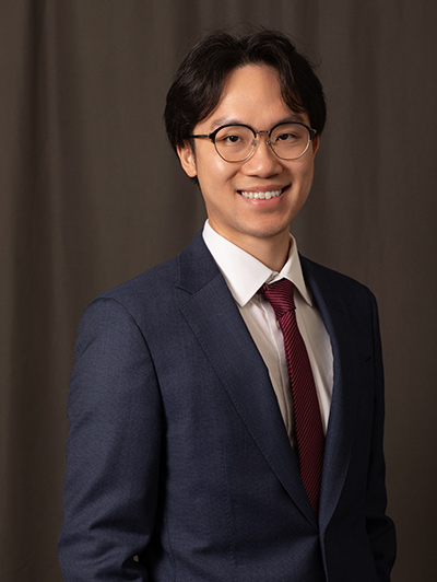 Justin Tam, Associate Counsel
